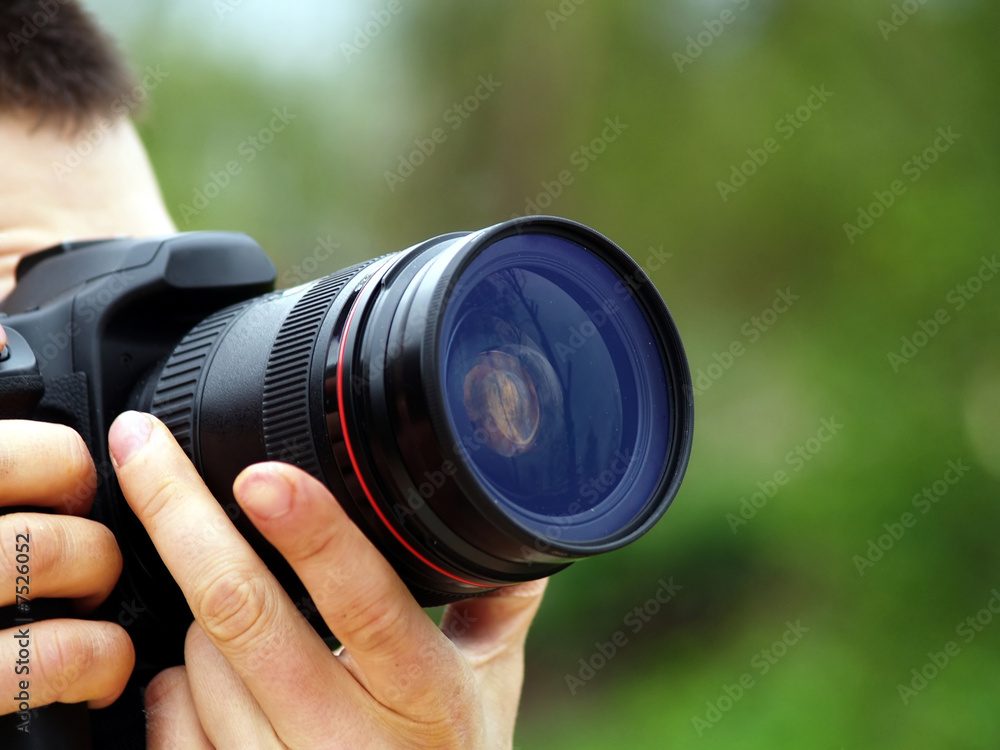 photographer shots with SLR camera