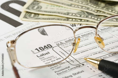 United States Tax Form, dollars and eyeglasses