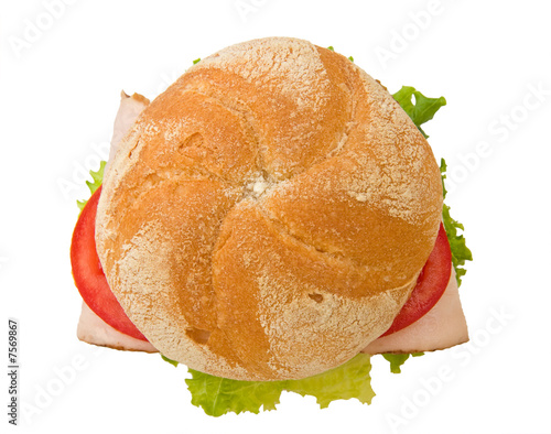 Top view of a crusty turkey kaiser sandwich