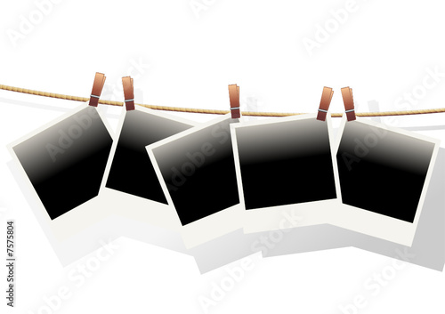Polaroid templates hanged on a rope over white background