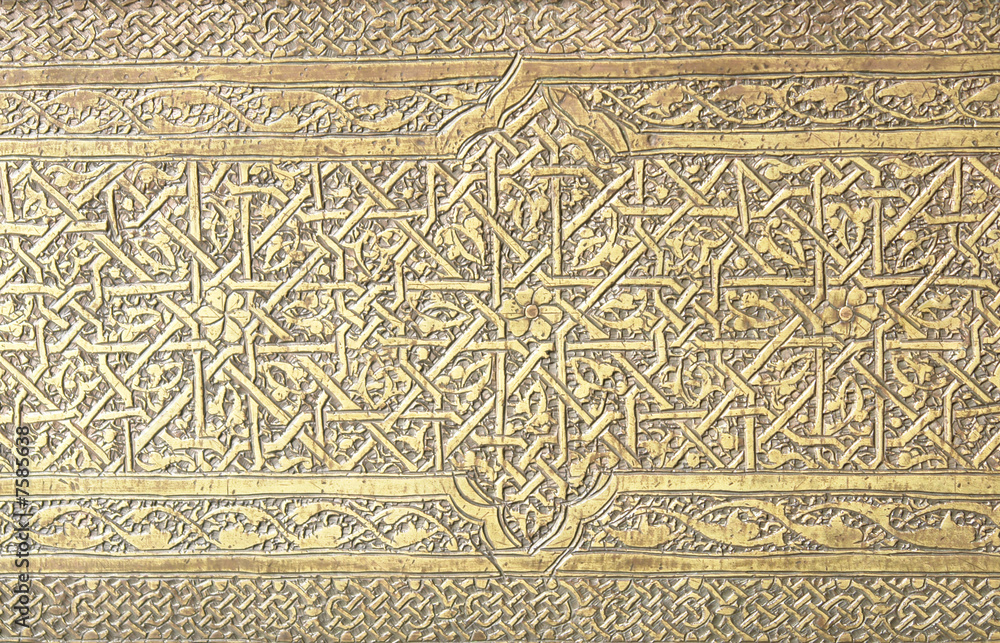 Islamic art patterns on a mosque main door in Damascus Islamic art patterns on a mosque main door in Damascus