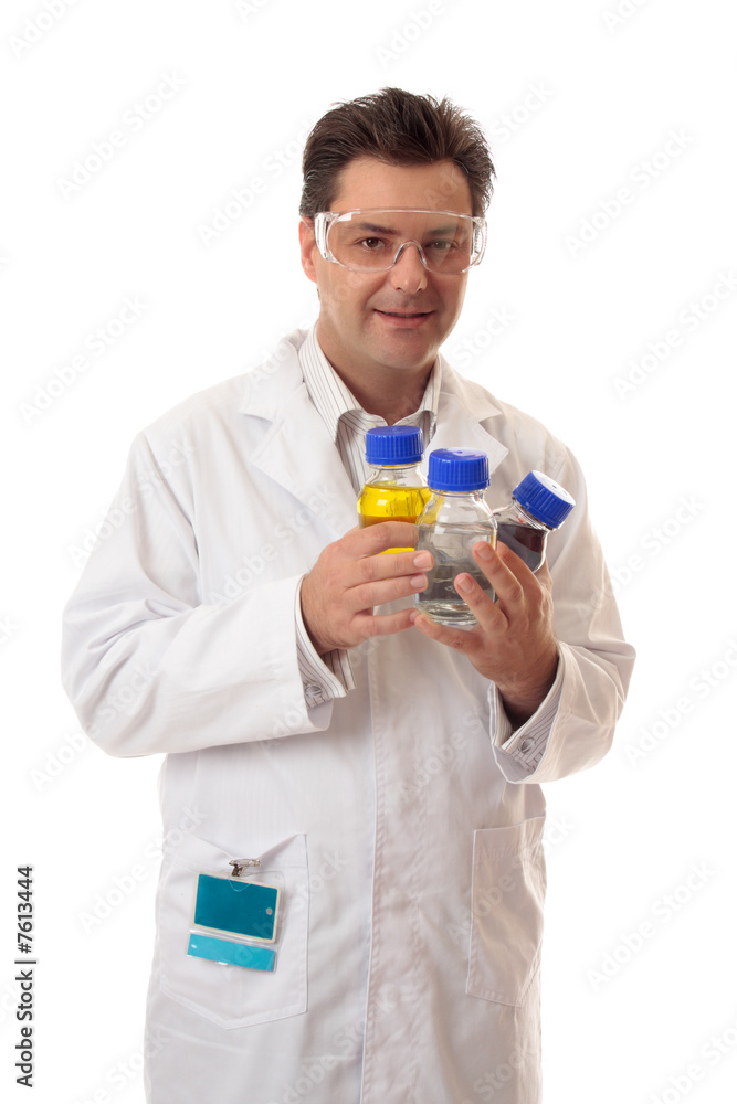 Laboratory chemist holding bottles of chemicals Laboratory chemist holding bottles of chemicals