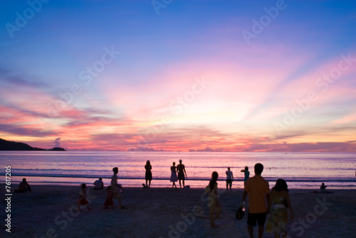 people on sunset beach, Patong beach, Phuket, Thailand