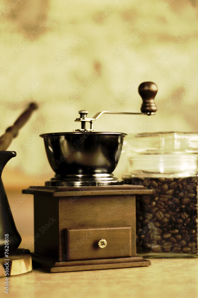Coffee - grinder with ibric on a table Coffee - grinder with ibric on a table