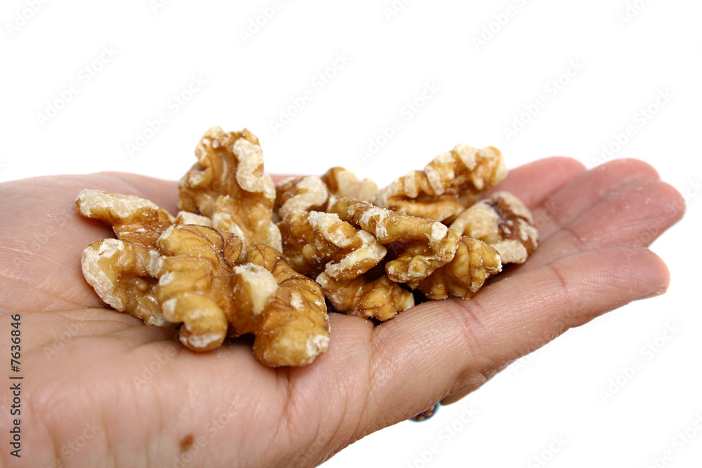 Peeled nuts in a hand Peeled nuts in a hand