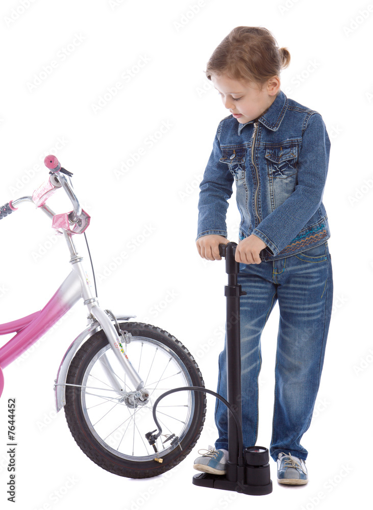 Young girl inflate wheel her bike Young girl inflate wheel her bike