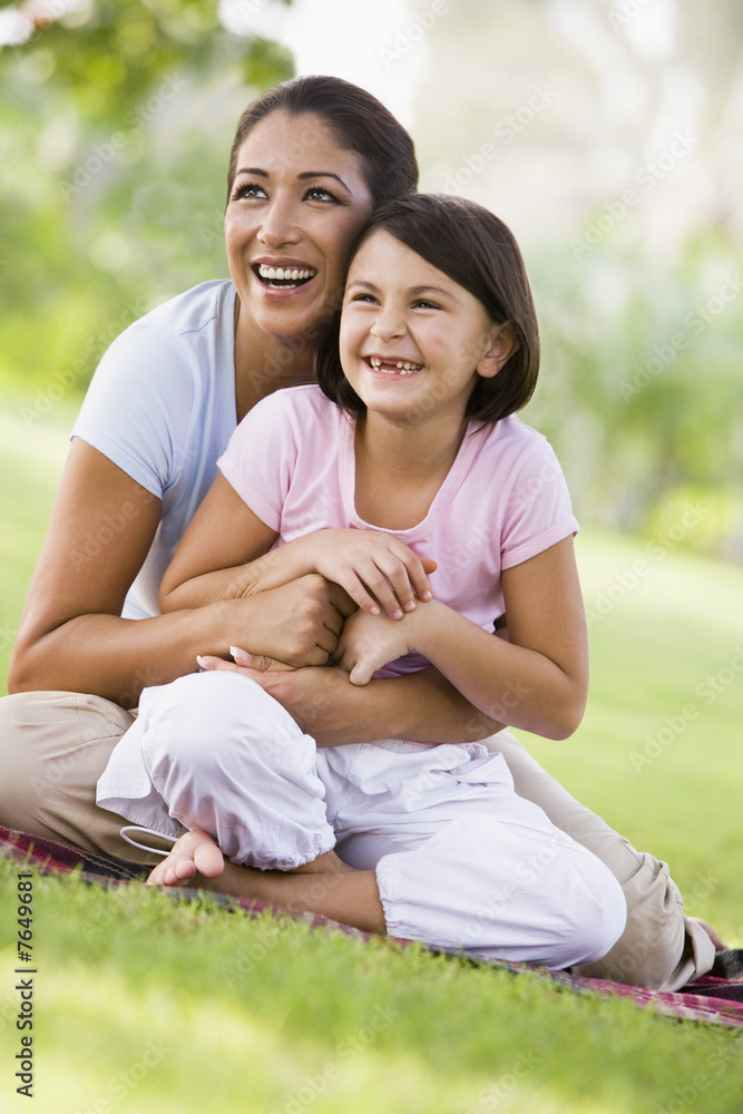 Mother and daughter in park
