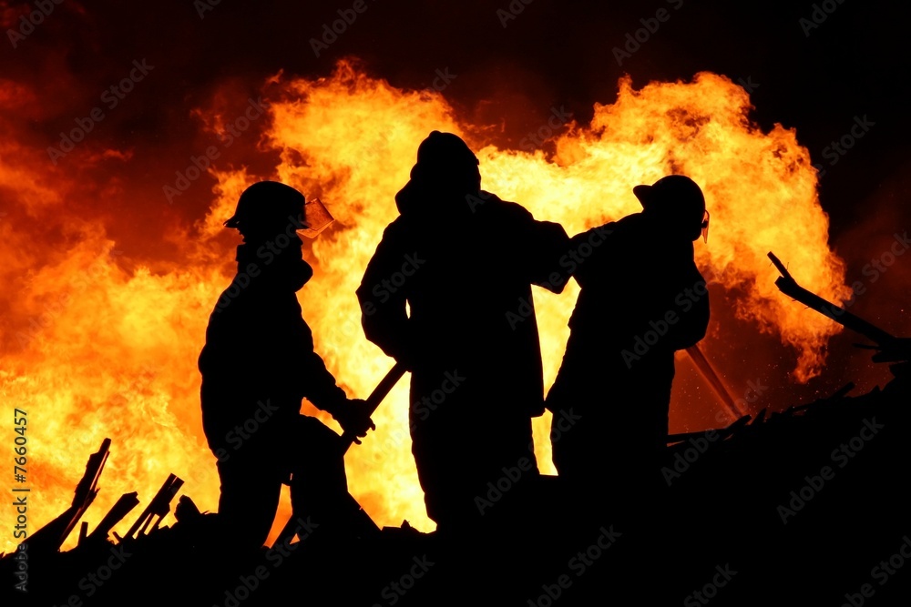 Fototapeta premium Fire fighters and huge flames