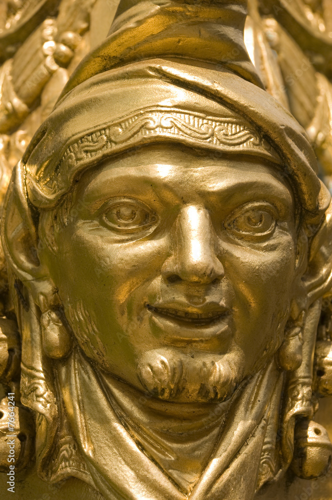 Face with the gold mask