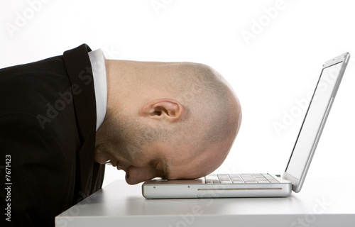 Stressed man and laptop