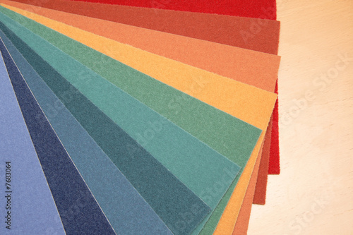 carpet samples on the table in a retail shop