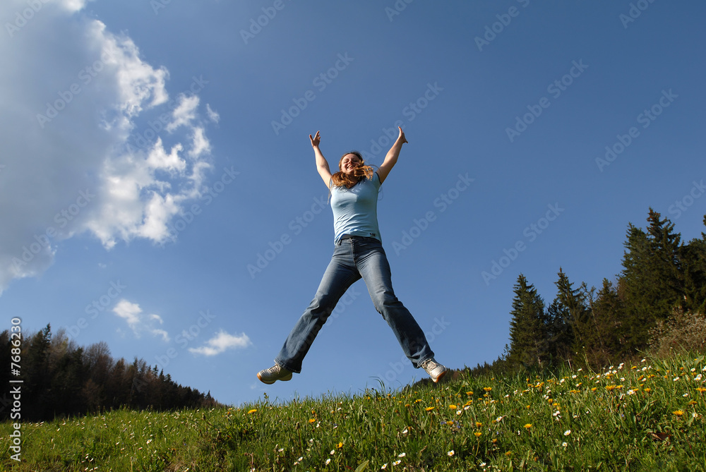 Young happy attractive female jumping Young happy attractive female jumping