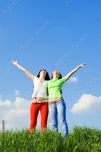 two happy young women dreams to fly