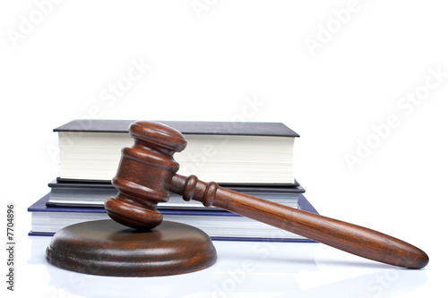 Wooden gavel and law books