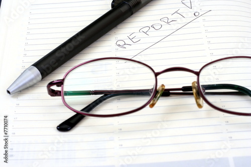 notepad pen with eyeglasses