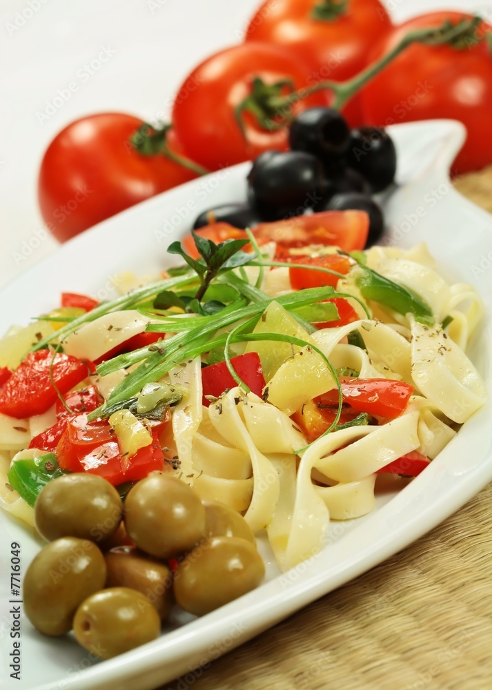 Spaghetti with vegetable,  olives and tomato  