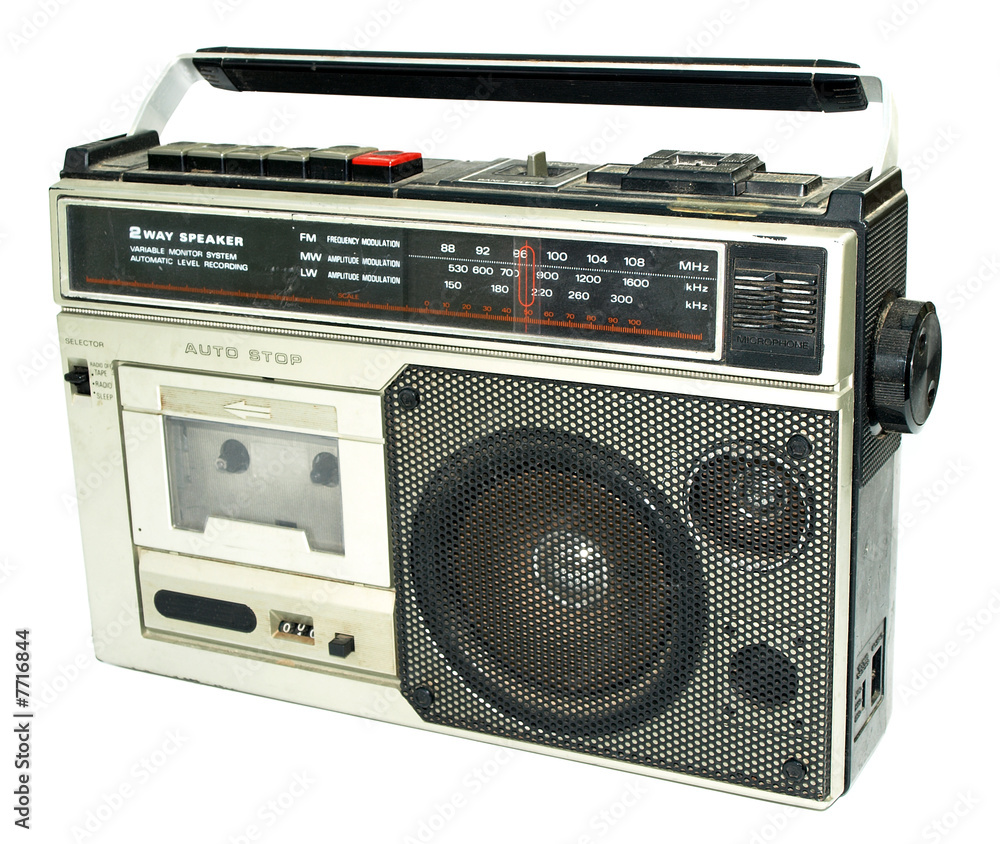 Dirty old 1980s style cassette player radio against a white back Stock  Photo | Adobe Stock