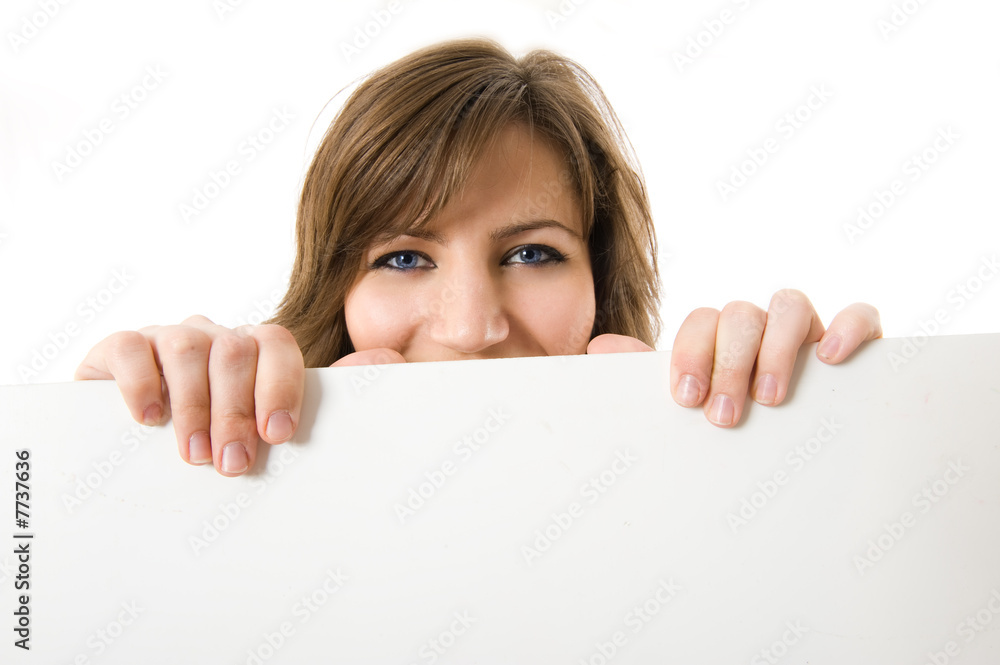 Close-up. Beautiful woman holding a billboard. Close-up. Beautiful woman holding a billboard.