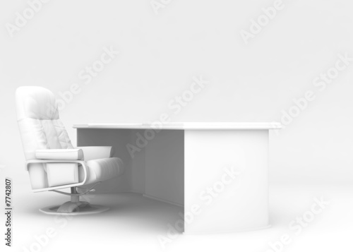 Desktop and armchair on a w...