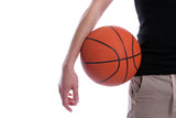 Detail of casual man holding a basketball ball