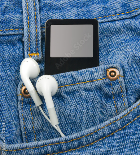 MP3 Player with Earphones in Jeans Pocket