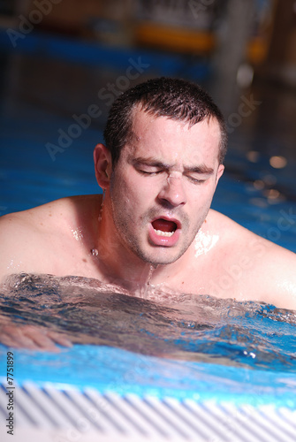.man in swimming pool © .shock