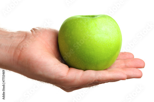 Man holding delicious green apple