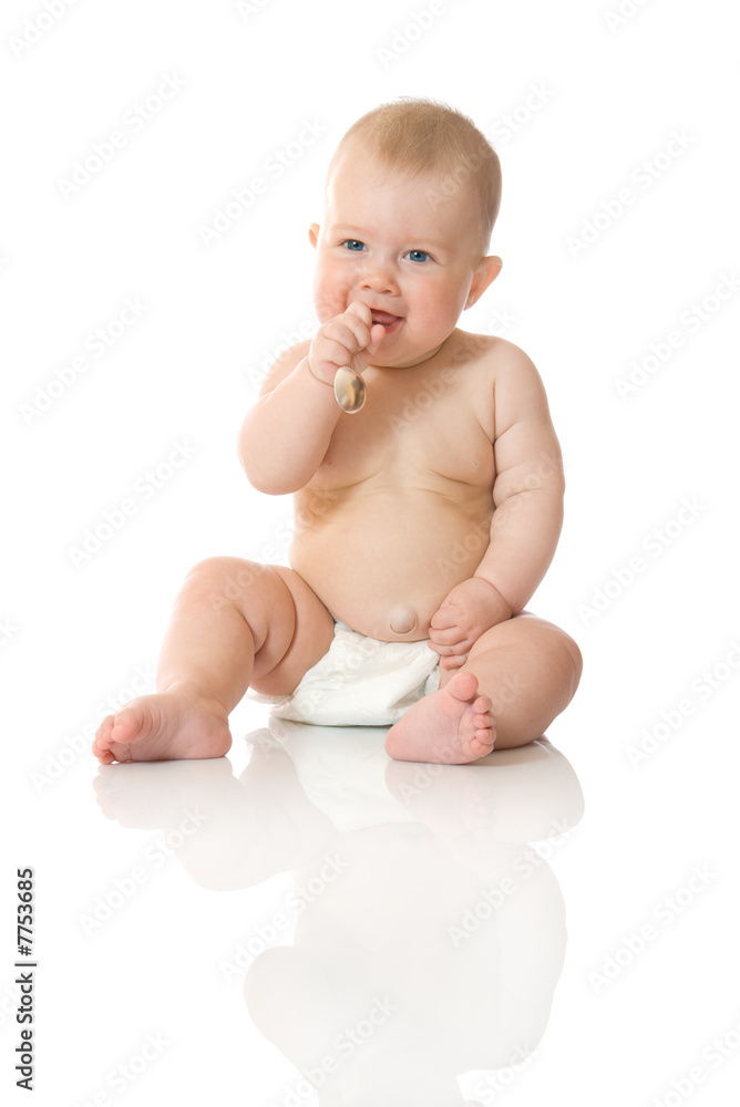 Small baby playing with spoon #2 isolated Small baby playing with spoon #2 isolated