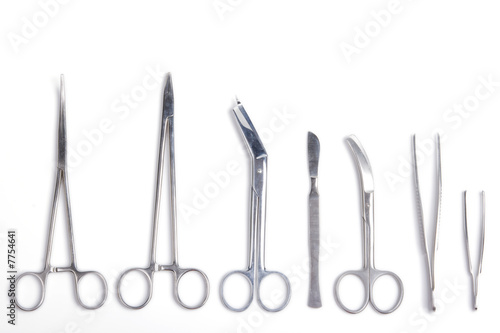 Surgeon tools - scalpel, forceps, clamps, scissors - isolated