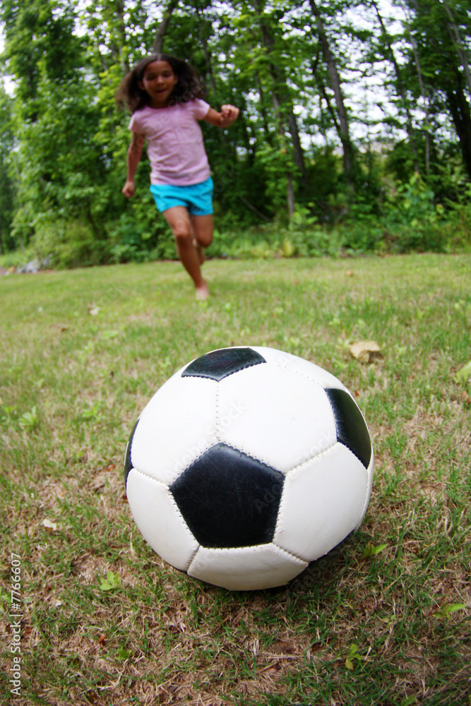 Girl Playing Soccer