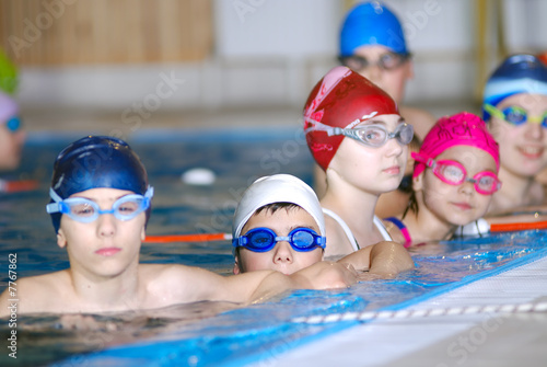 .childrens in serie at swimming pool