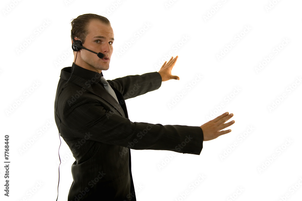 Successful young businessman wearing headphones Successful young businessman wearing headphones
