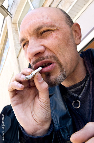 typical criminal with cigarette