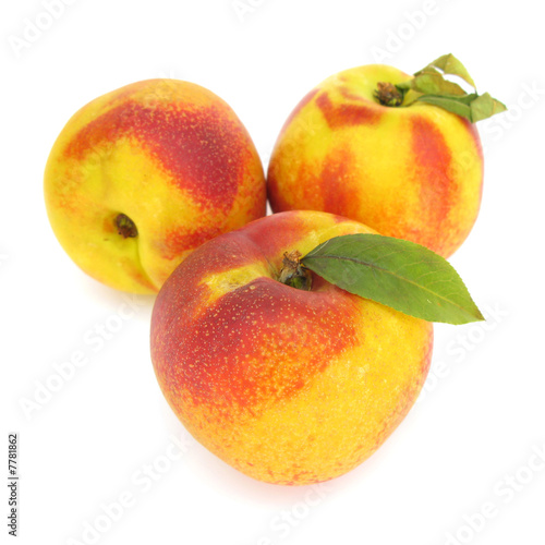 Nectarines peaches isolated on white background