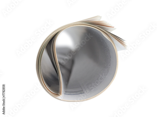 Rolled newspaper isolated on white