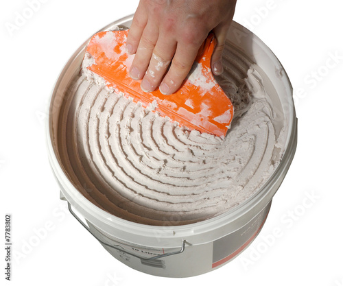 bucket of tile adhesive