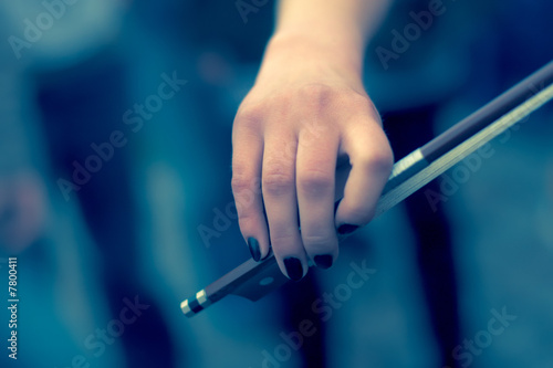 Hand with fiddlestick