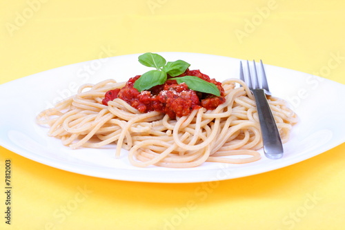  Spaghetti bolognese served on white plate