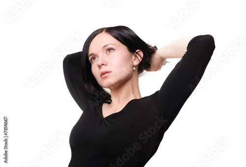 Portrait of a beautiful young woman looking upward