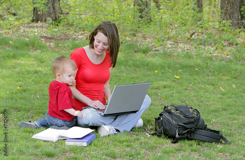 mom and son on laptop photo