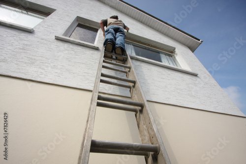 Man using a ladder