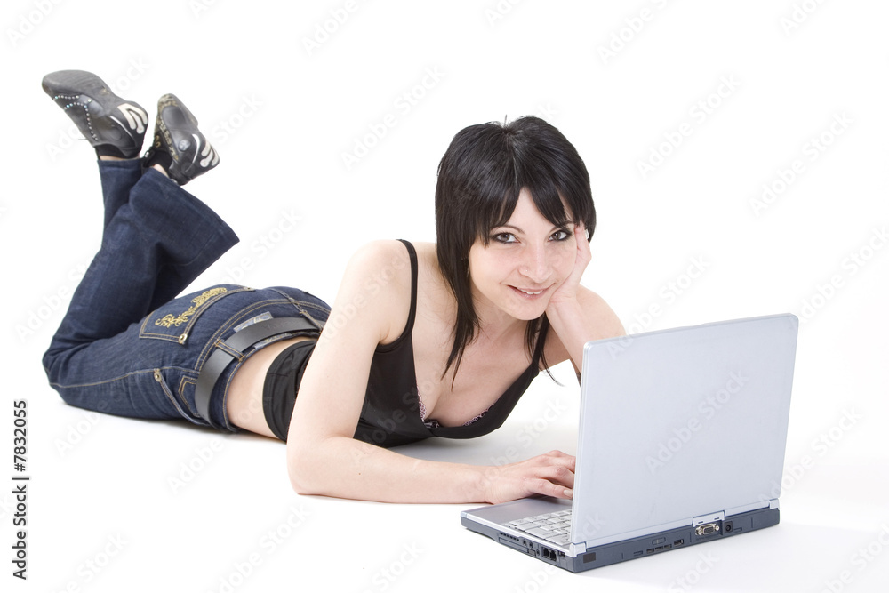 A young lady with a computer on white background. A young lady with a computer on white background.