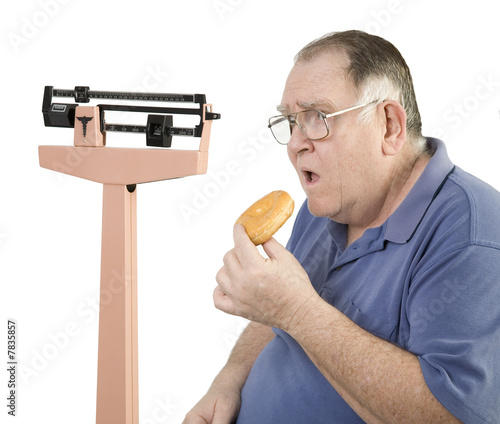 big guy and donut looking at scale