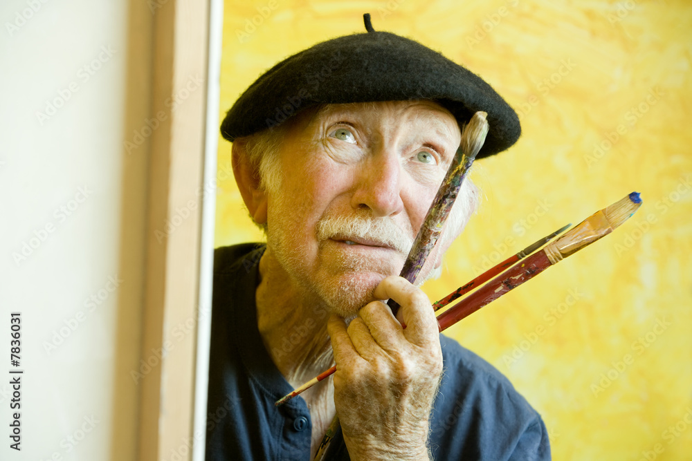 Artist with a Beret at a Canvas looking up Artist with a Beret at a Canvas looking up