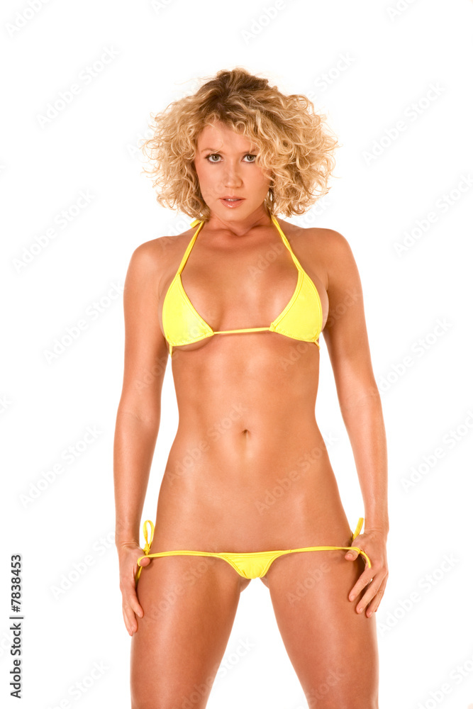 Sassy blonde female in skimpy yellowStock Photo Adobe Stock Sassy blonde female in skimpy yellowStock Photo Adobe Stock