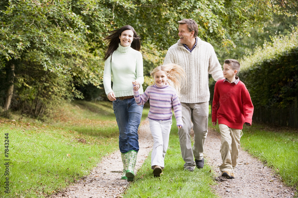 Family on walk through countryside Family on walk through countryside
