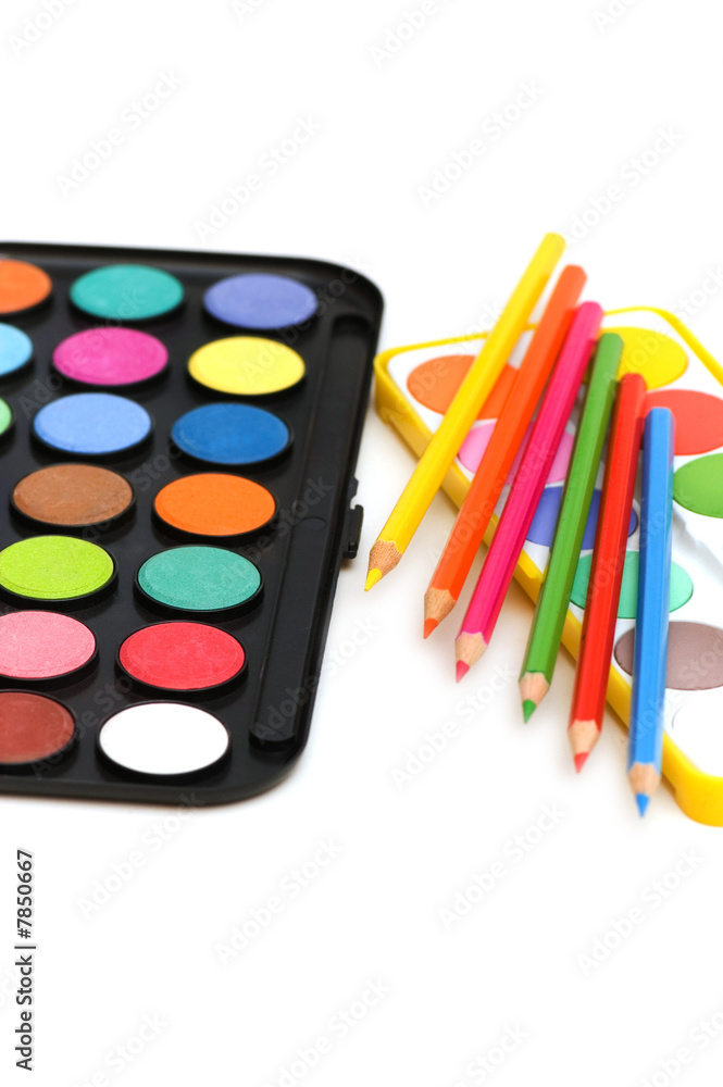 Palette and pencils isolated on the white Palette and pencils isolated on the white