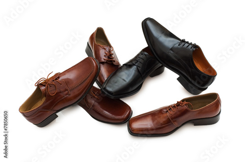Various male shoes isolated on the white