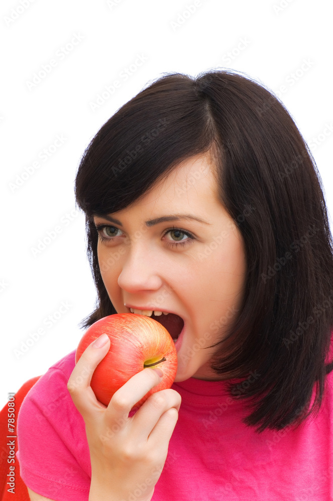 Girl biting red apple isolated on white Girl biting red apple isolated on white