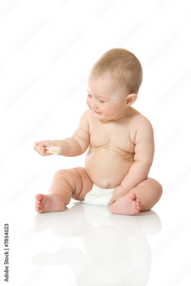 Small baby playing with spoon #3 isolated Small baby playing with spoon #3 isolated